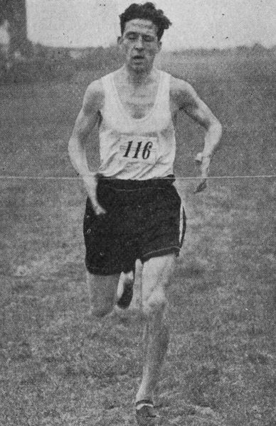 J Price (East Cheshire Harriers) winning the Youth's race
