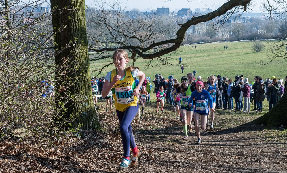 Maisy Luke (Cornwall AC) takes an early lead in the Under 13 Girl's race